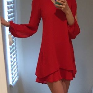 Lucy love red dress with pockets.